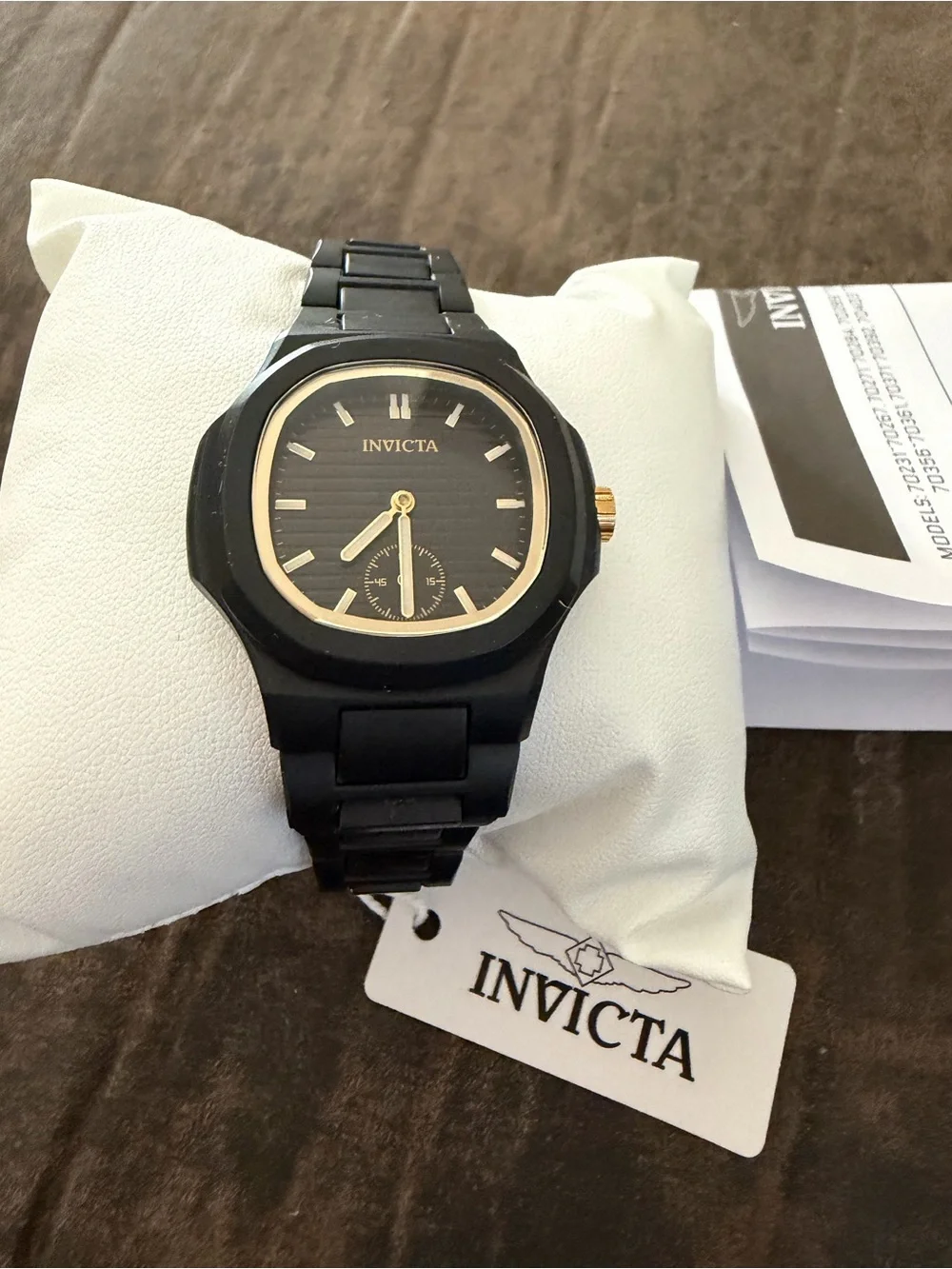 Invicta Women's Black Watch with Gold Accents